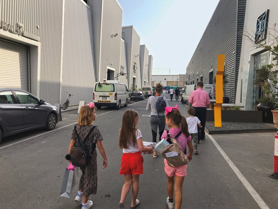  A family walks through one of Alserkal Avenue’s formerly industrial alleys