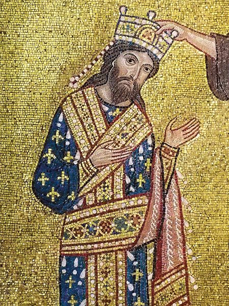 This mosaic in Santa Maria dell’Ammiraglio depicts the 1130 CE coronation of King Roger II, and it is the only known possible likeness of the king. 