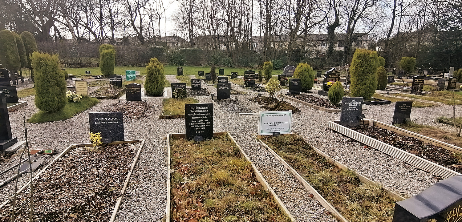 Today’s Muslim section of the cemetery in Preston, England, lies alongside the much older Protestant and Catholic sections, and it serves the suburb’s Muslim community of about 15,000. It includes the marker for the final resting place of Ismaeel Nakhuda’s father Mohammed, which can be seen here at center left. Nakhuda notes that these days his own son is, like so many others throughout the metropolitan area, a “diehard” fan of LIverpool FC and Mo Salah. 