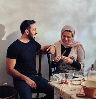 Anas Atassi, pictured here with his mother, was born in Homs, Syria, and now lives in Amsterdam.
