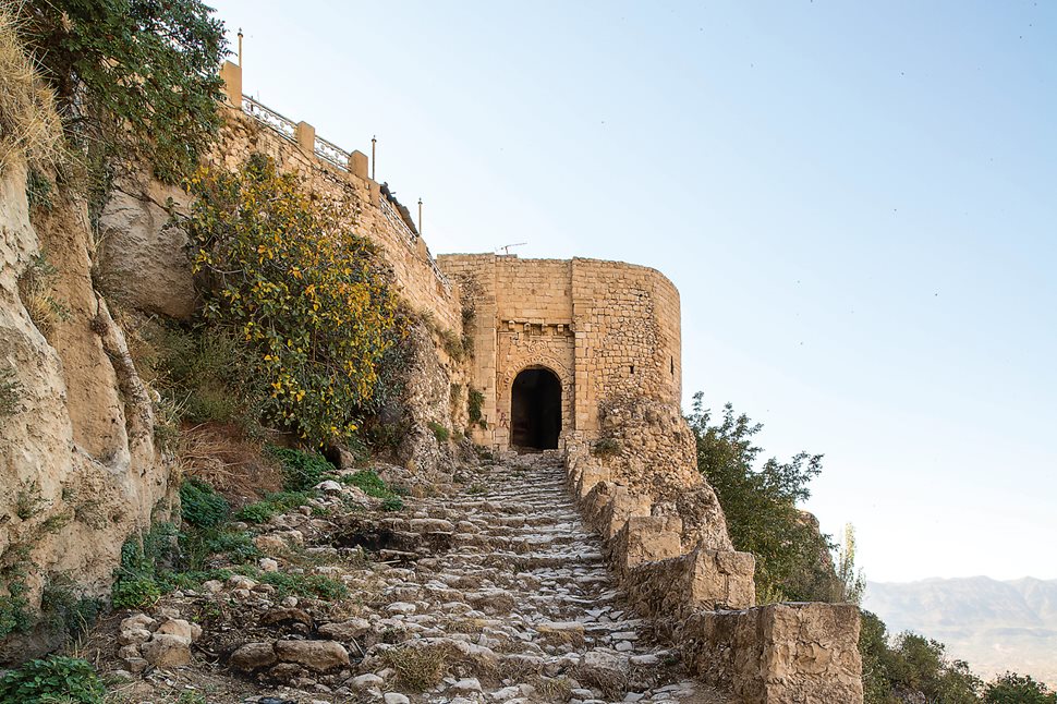 Below right Zainab Bahrani and her team are helping to preserve the 13th-century CE gate of the Amedi (Arabic al-Amadiya) Citadel, above, a centuries-older stone staircase and rock reliefs, paying equal attention to the site’s Islamic and pre-Islamic elements.