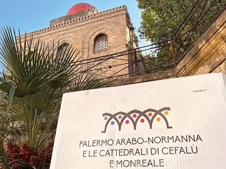 The UNESCO World Heritage Site designation appears outside San Cataldo in downtown Palermo.