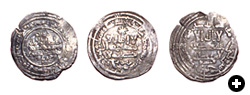 These silver dirhams circulated in 10th-century al-Andalus.