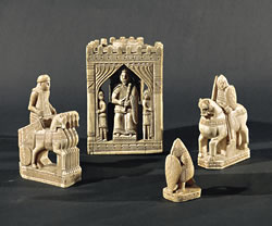 Ivory pieces from 12th-century southern Italy show the rook as a charioteer in a quadriga, the knight as a mounted warrior in chain mail, the king in his castle and the pawn as a foot-soldier with his shield.