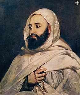 An undated portrait of the amir, or prince, by Jean Baptiste Ange Tissier shows him with dignity and even reverence—note the prayer beads in his right hand—qualities that are common in French depictions of Abd el-Kader.