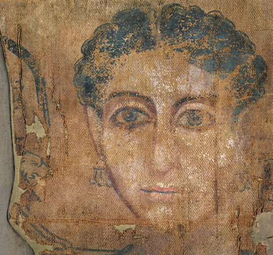 The streets of Alexandria, below, right, are as accustomed to the bustle of commerce today as they were in the second to fourth centuries ce, when Strabo called it “the first city of the civilized world” and an Egyptian artist used tempera to paint this young woman’s portrait, above, on linen. 
