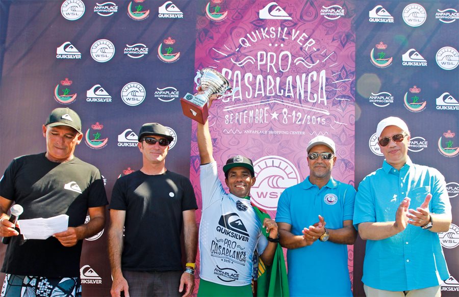 <p><em>Above: </em>In the inaugural Quicksilver Pro Casablanca, Portuguese surfer Pedro Henrique holds the trophy after winning the competition in the first World Surf League event this past September in Morocco. <em>Below:</em> An event poster promoting the European Surfing Federation’s 2015 European Surfing Nations Championship held in Ain Diab, Casablanca, Morocco, the first Eurosurf event to take place in the country. Defending champion France won the event with seven medals, while Morocco placed third with four.</p>