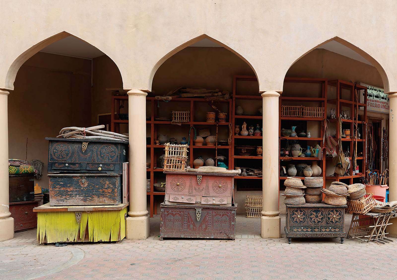 <p>Many ordinary antique chests show great wear today, such as these on sale in a market in Oman.</p>