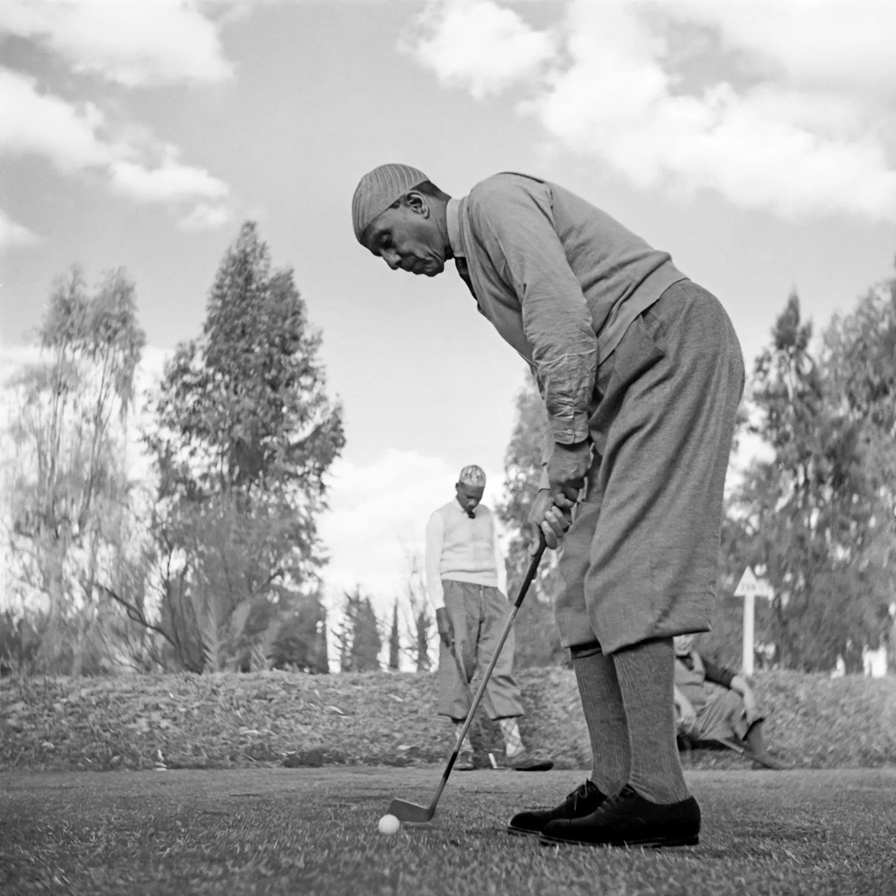 The pasha of Marrakech, Morocco, Thami El Glaoui, plays golf in April 1946.