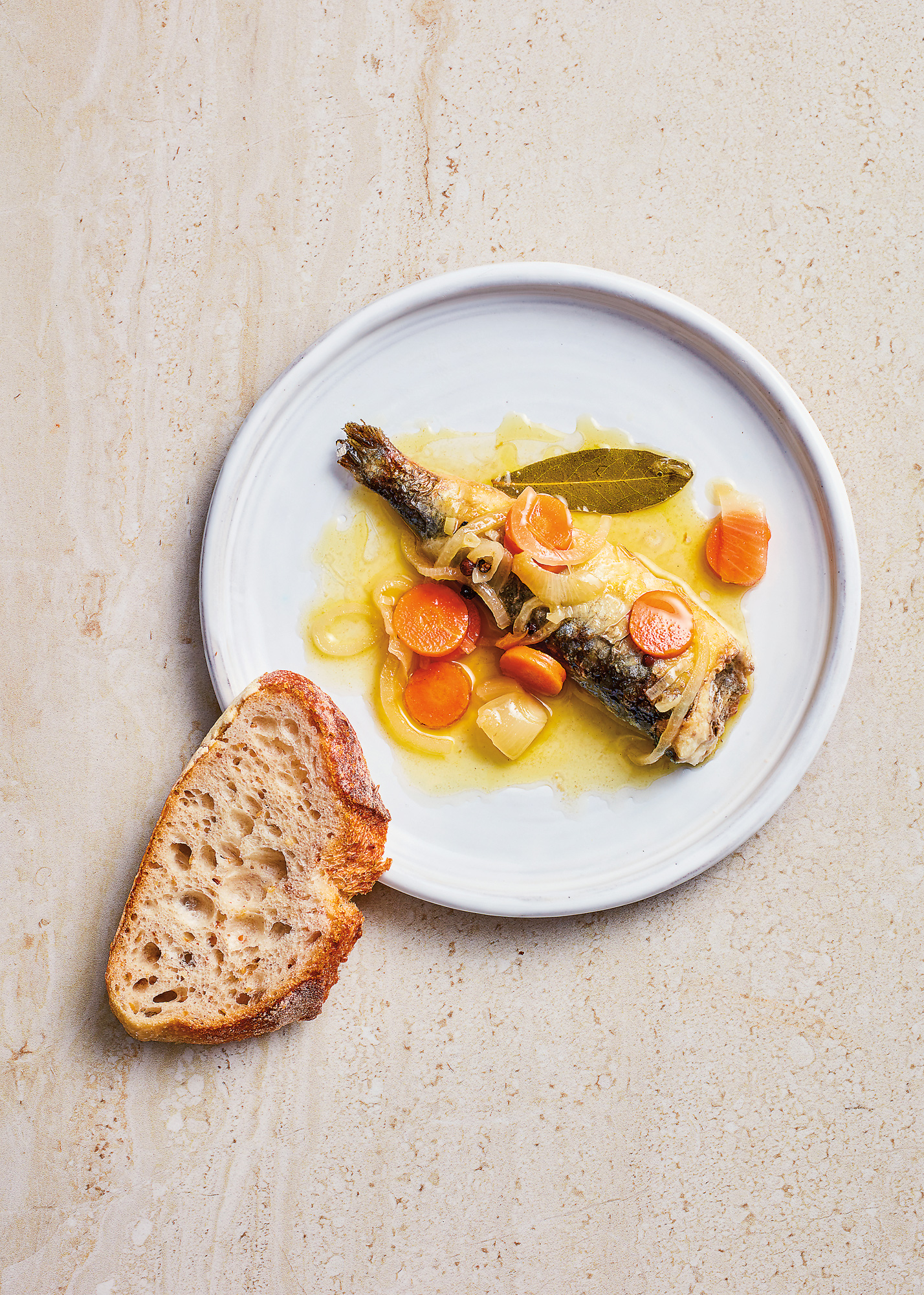 Sardines in escabeche marinade, a dish using escabetx, relies on a method for preserving fish that has carried over from the era of Muslim Spain. 
