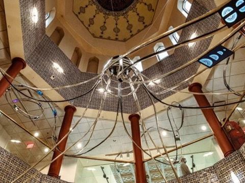 Al-Falaq is site-specific multimedia sculpture by Yemeni Bosnian, US-based artist Alia Ali conceived as a starship that is reclaiming Yemeni artifacts housed in famous collections in Europe and the US. Suspended under a dome, 81 digital screens display a range of experimental videos that embrace objects, ideas and heritage with an eye toward Yemeni futurism.