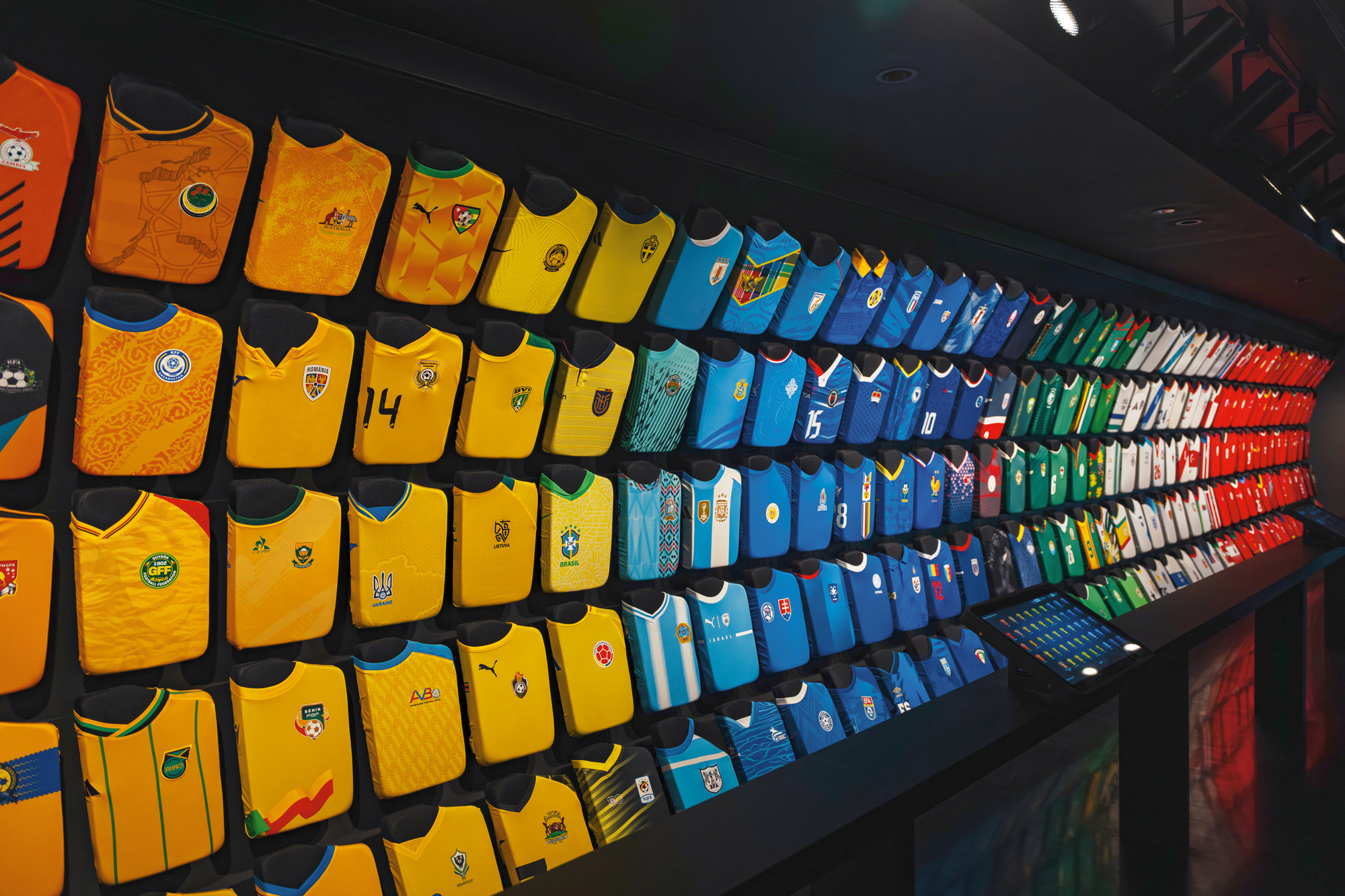 The symbolic “Rainbow of Shirts” displays jerseys from all 211 FIFA member associations. 