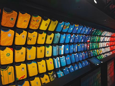 The symbolic “Rainbow of Shirts” displays jerseys from all 211 FIFA member associations.