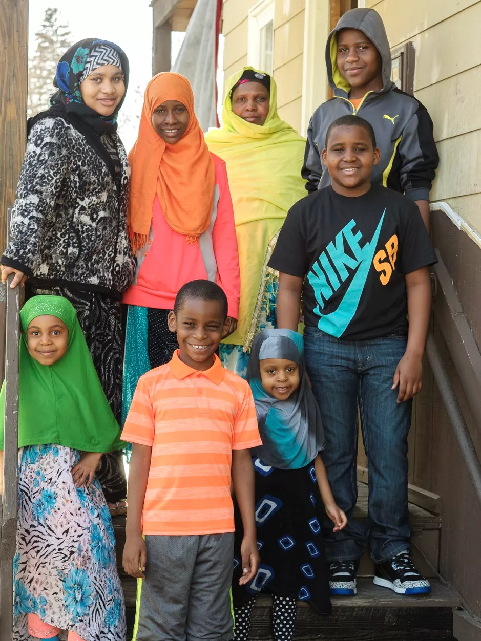 At home in Lewiston, Sahro Hassan stands at top left with her mother and siblings around her. Of the family's journey from Somalia to Kenya to Maine, Hassan says, &ldquo;No one would choose to grow up in hardship, but I believe that if I can overcome my past, I can overcome anything.&rdquo;