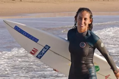 <p>&ldquo;I knew I had to try it,&ldquo; says three-time national champion Meryem El Gardoum.&nbsp;<em>Below: </em>A local surfer prepares to make the 20-minute walk from Taghazout south to Devil&rsquo;s Rock, where the point break makes it an inviting location for those learning the sport.</p>
