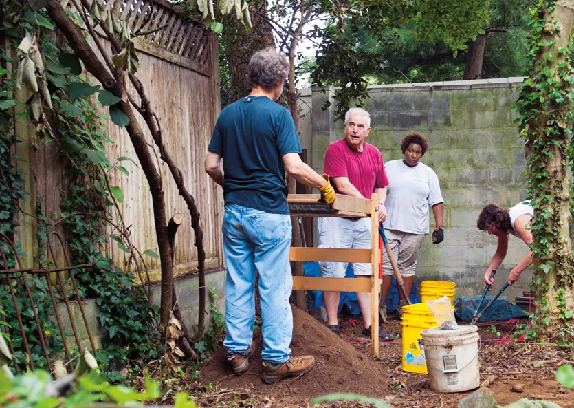 <p>James H. Johnston, author of <em>From Slave Ship to Harvard: </em><em>Yarrow Mamout and the History of an African American Family</em>, stands, second from left, at the Dent Place dig site. He is flanked, left, by retired archeologist Charlie LeeDecker and, right, by Mia L. Carey, project field director, and Ruth Trocolli, city archeologist.&nbsp;</p>
