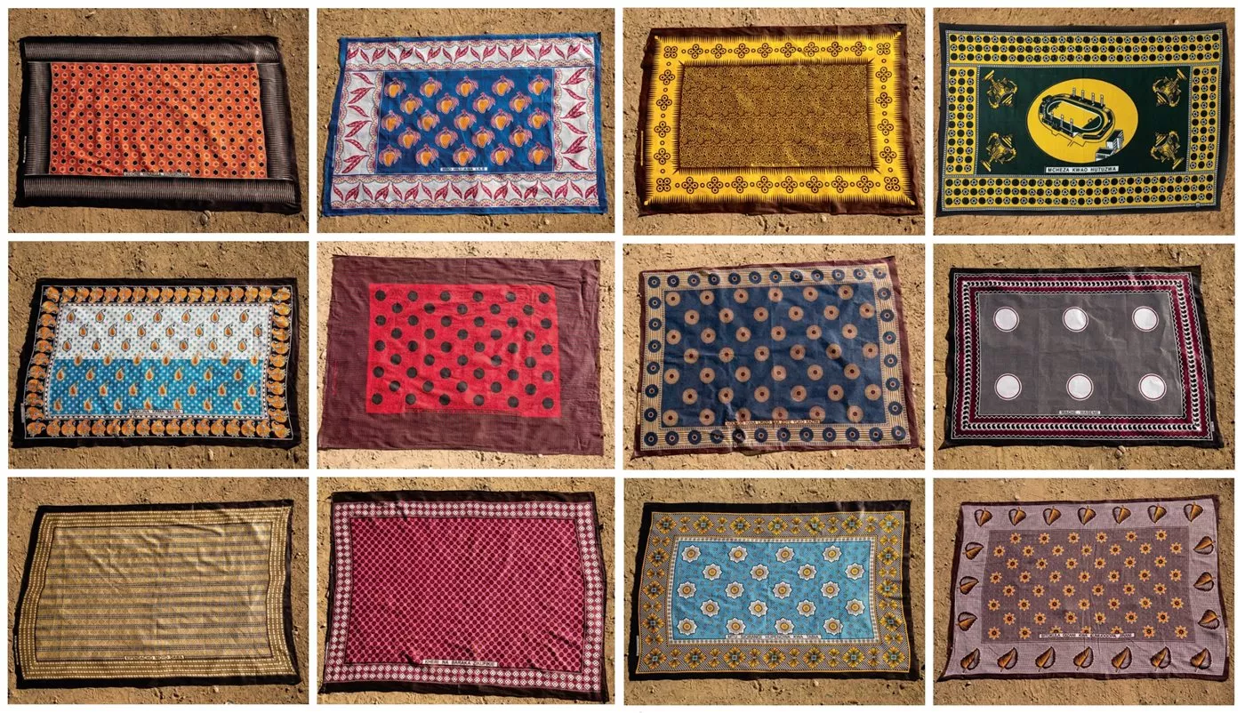 <p>Long a form of social media, a kanga communicates through design, color and especially the <em>jina</em> (&ldquo;message&rdquo;) that generally appears at the bottom of each <em>mji</em>, or central panel. <em>Left six, clockwise from top left</em>, and translated colloquially, these kanga say: &ldquo;Don&rsquo;t see [your beauty or success] as something achieved alone; it&rsquo;s been made possible by others&rdquo;; &ldquo;A person doesn&rsquo;t have this, but they have that&rdquo;; &ldquo;There is no one like mom&rdquo;; &ldquo;Better to be poor like me than to be rich like my friend&rdquo;; &ldquo;That which loves your heart is medicine&rdquo;; and &ldquo;May the best of all blessings come to you.&rdquo;</p>

<p>Right six, clockwise from top left: “A respectable person is not troubled”; “The one who plays at home is rewarded”; “A liar never takes a break; they’re at work 24/7”; “Let them talk”; “A person is not their color; they are loved for their character”; and “I won’t eat in the darkness for fear of my neighbor (I do what I want!).”</p>
