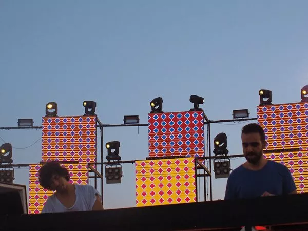 Musician and producer Nomad Saleh, left, recently brought French electronic artists together with traditional Egyptian desert musicians at the remote oasis of Siwa. Center: Cairo-based Karim El Zanfally and dj Gaser El Safty perform live as The Meteors Project, layering tempos and musical geographies on Sandbox’s main stage. The festival’s smaller stage, right, offers a club-sized space for artists such as Cairo-based Zeina, right. “In Egypt, if you have something noble to say, the crowd is with you,” she says. 