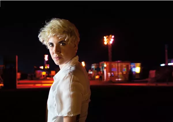 The festival’s smaller stage, right, offers a club-sized space for artists such as Cairo-based Zeina, right. “In Egypt, if you have something noble to say, the crowd is with you,” she says. 