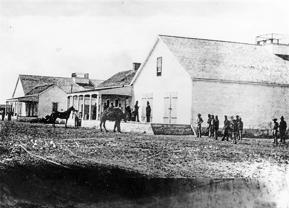 An army camel stands near the center in this detail in a photograph taken in 1863 at Fort Tejon, California. The image was made during a geological survey of Southern California, where many of the camels were moved after the onset of the Civil War in 1861. From there, the camels transported supplies between army installations and towns until the “camel experiment” was disbanded in 1881