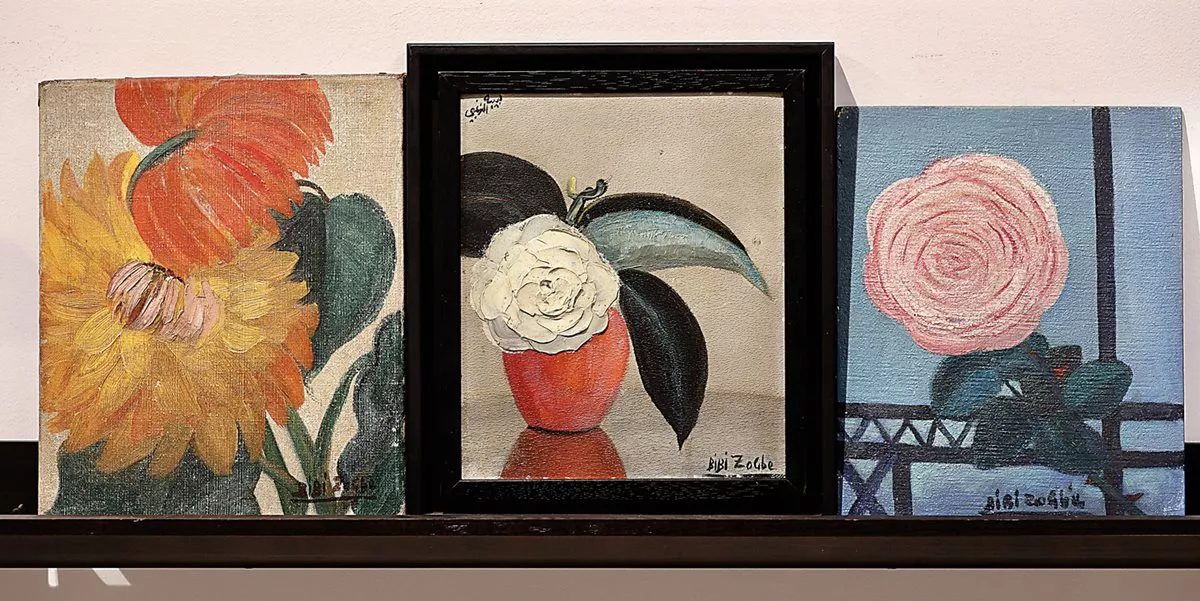 Left “Chrisentemos” (Chrysanthemums), undated, oil on canvas, 31 x 25 centimeters. center Untitled, 1935, oil on masonite: This painting shows her use of thick paint to achieve a 3D texture. right “La Rosa en el balcon” (The rose on the balcony), 1956, oil on wood, 30 x 24 centimeters.
