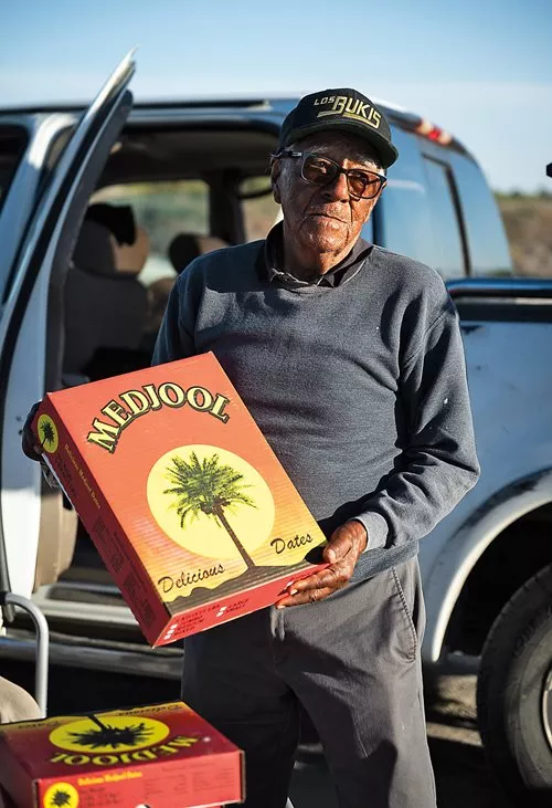Ninety-three-year-old Julian Delgadillo sells Medjool dates from his truck in Mecca. 