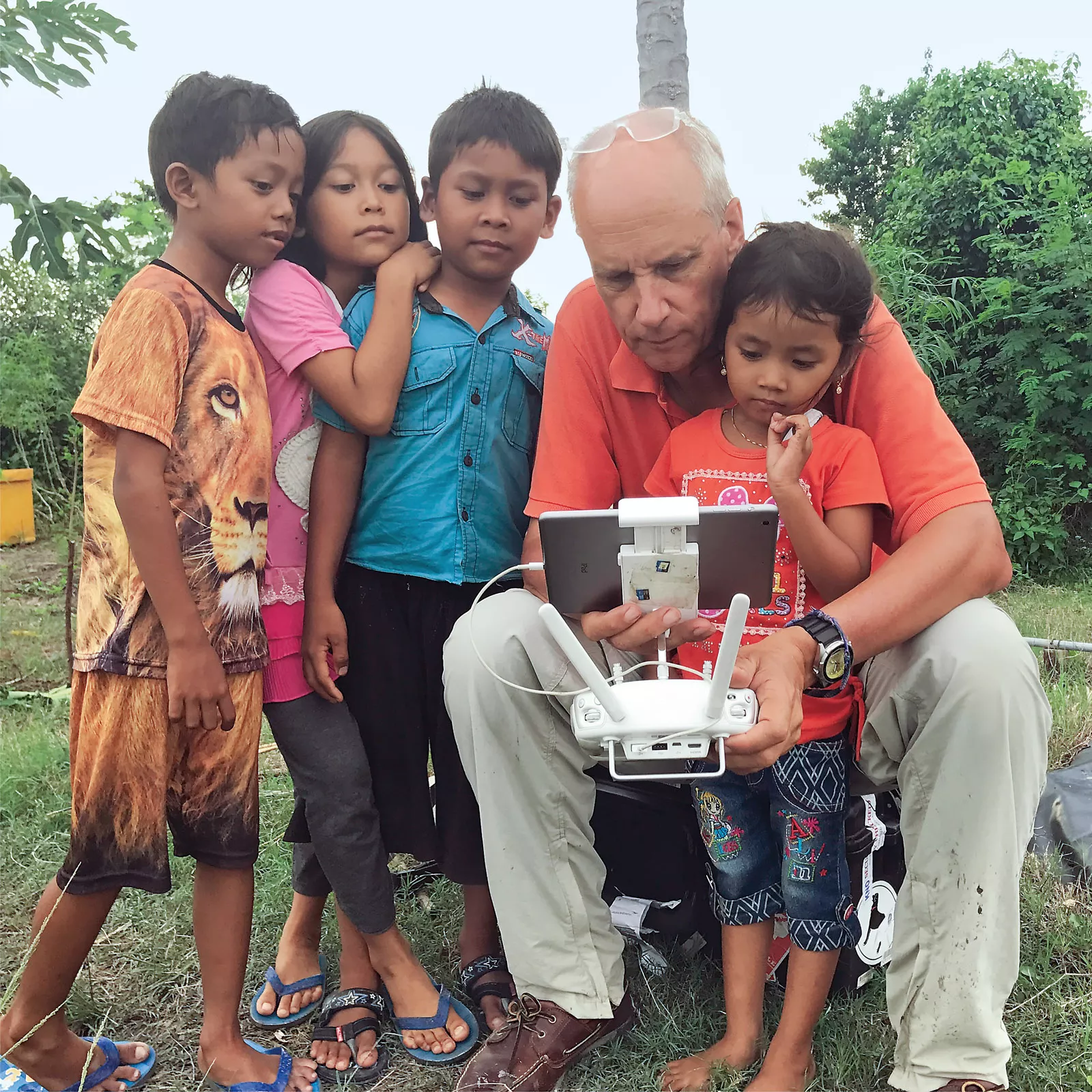 These days Steinmetz more often sends a drone up to capture his  images—sometimes under the watchful eye of curious young locals, as in 2016 in  Indonesia.