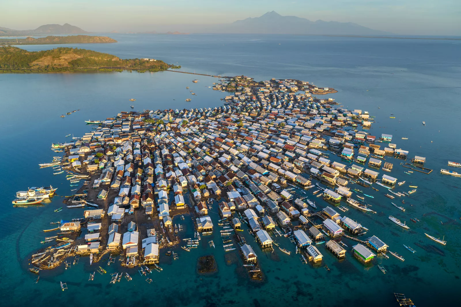 Steinmetz documented the homes of the Bajau, a culture of fishermen and seaweed  farmers, that are clustered on a man-made coral atoll off Bungin Island in  Indonesia.