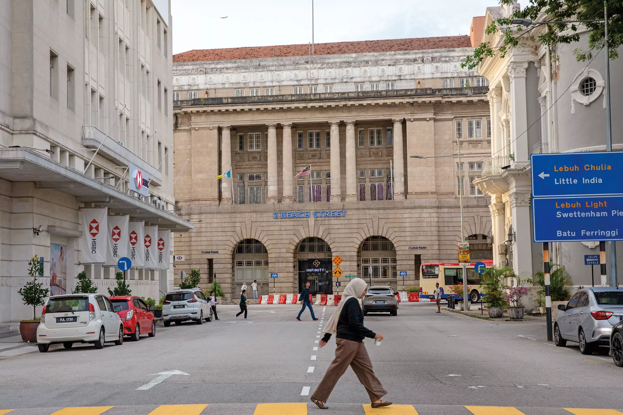 Institutions of commerce along Beach Street reflect the city’s British colonial heritage and mercantile past.