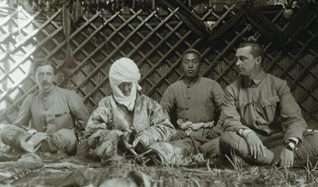 One of the only photographs of Kurmanjan Datka was made by Finnish Colonel Carl Gustaf Mannerheim in 1906, when she was about 95.&nbsp; From left to right: French ethnographer Paul Pelliot, Kurmanjan Datka, a grandsom of Kurmanjan Datka and Carl Gustaf Mannerheim.