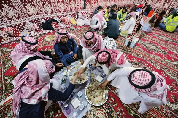 Trays of camel meat with rice make for traditional far for owners, breeders and family members at the annual King Abdulaziz Camel Festival near Riyadh, Saudi Arabia. The meat of a single camel can feed up to several hundred people. Before registration this meant that a camel would be slaughtered only for a major event.