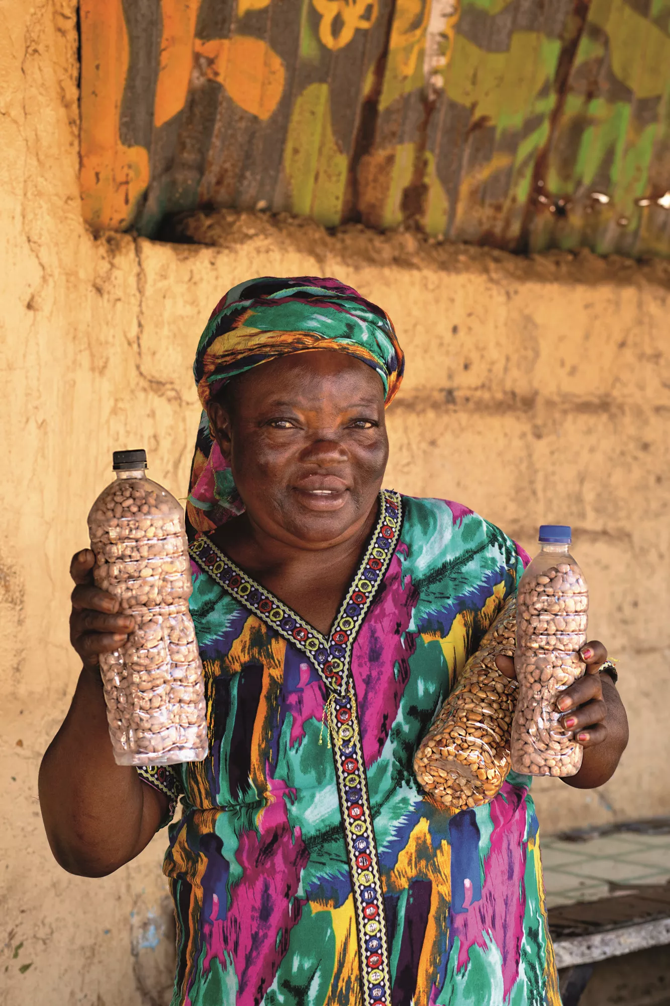 In Bakau, a town along Gambia’s Atlantic coast, Florence Onwuegble, of Nigeria, is among the many selling groundnuts—fresh, roasted, salted or sweet. 