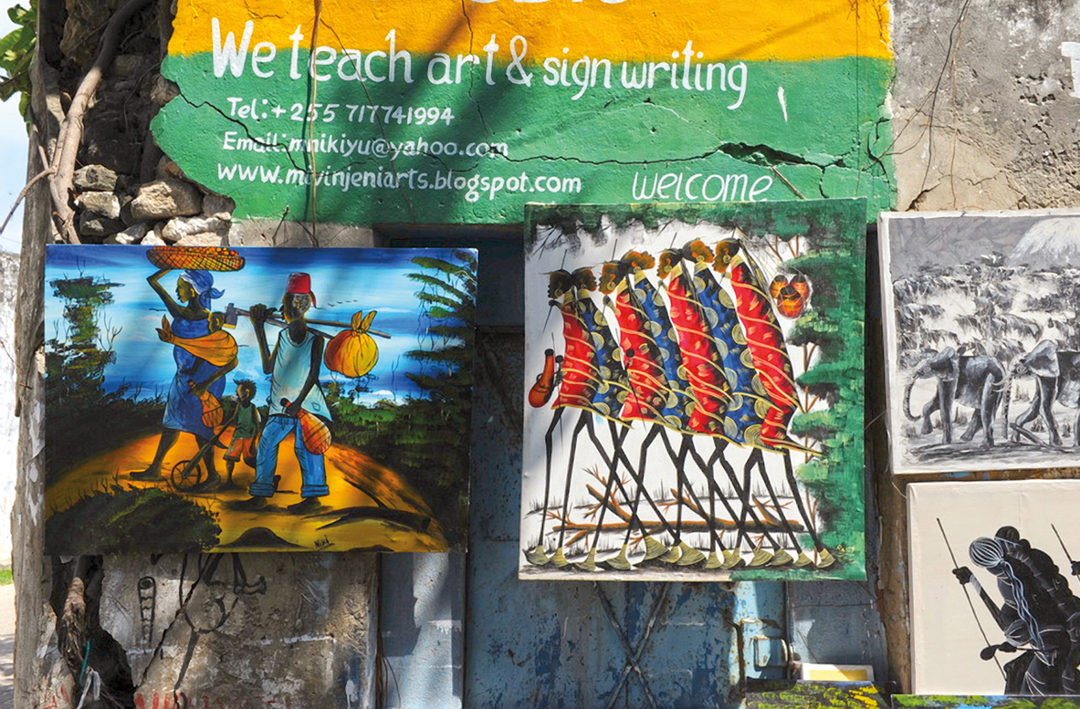 Appearing here as a theme in local paintings at an art shop, journeys have meant much to the history of Bagamoyo&mdash;whose poetically ambiguous name means both &ldquo;to unburden&rdquo; and &ldquo;to lay down&rdquo; your heart&mdash;gateway east across the Indian Ocean and west into and out from the continent.&nbsp;