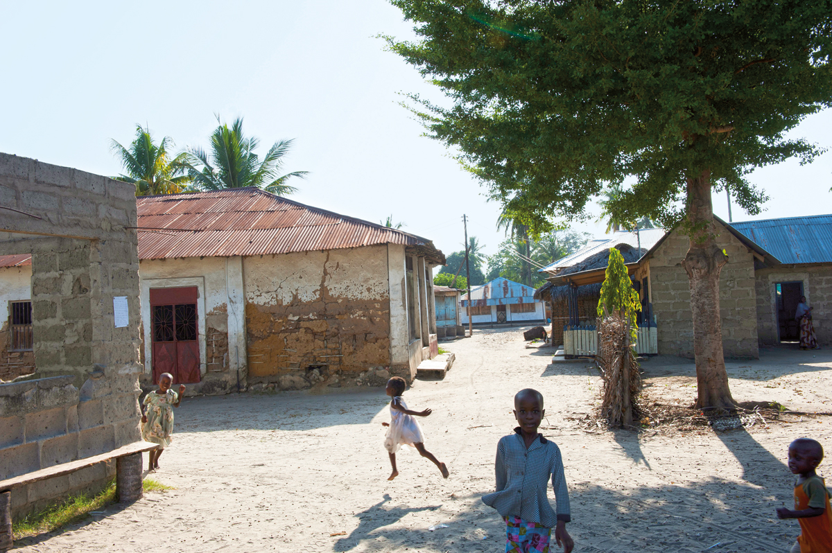 South of Bagamoyo, children play in the village of Mlingotini at the edge of the five-kilometer stretch of coast marked for mega-port construction. Growth in the area is already evidenced by new apartments,&nbsp;<em>below</em>.&nbsp;