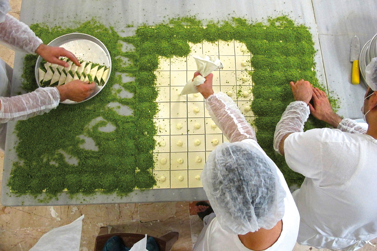 Baklava filling is called&nbsp;<em>kaymak</em>&mdash;a cream of milk and semolina&mdash;and it is mixed with the ground pistachios, the most expensive ingredient. Gaziantep is near some of the world&#39;s best pistachio orchards, and most of its baklava contains about one-fifth pistachios by weight. Below, a tray of baklava bakes for 25 minutes at 200&deg; centigrade (392&deg; F).