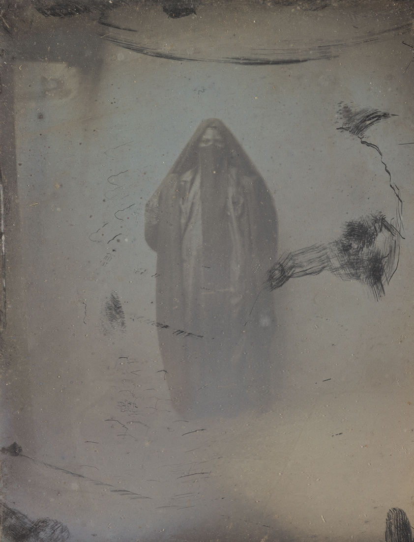 Heavy fading lends a ghostly quality to this daguerreotype portrait made by Girault de Prangey in 1843 of a woman whose name he recorded as Ayoucha.