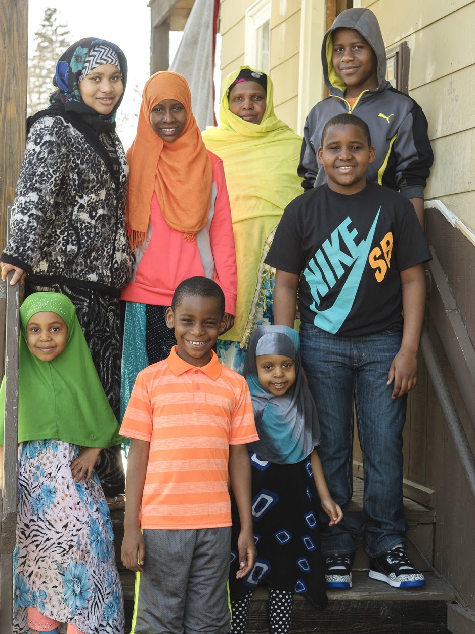 At home in Lewiston, Sahro Hassan stands at top left with her mother and siblings around her. Of the family&#39;s journey from Somalia to Kenya to Maine, Hassan says, &ldquo;No one would choose to grow up in hardship, but I believe that if I can overcome my past, I can overcome anything.&rdquo;