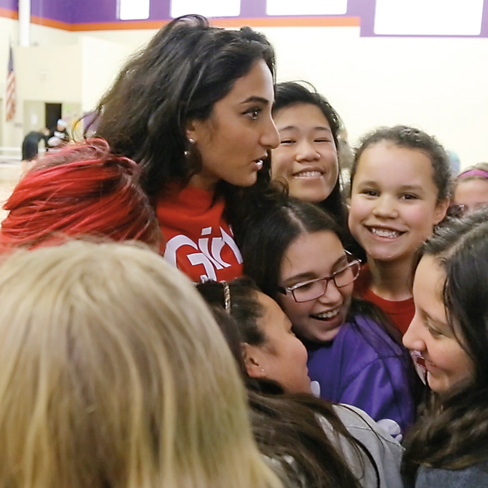 Students at the Girls Athletic Leadership School in Denver, Colorado, embrace Raha Moharrak. &ldquo;You are capable of wonders,&rdquo; Moharrak says. &ldquo;Feed your bravery, and it will overcome your fear; never feel that your dreams are too far from reach.&rdquo;