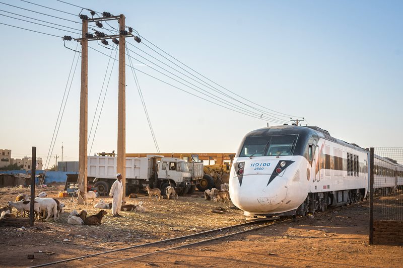 A Chinese-built locomotive pulls out of the Khartoum Bahri train station en route to Atbara, with a stop at pyramid-rich Meroë—a 330-kilometer trip. 