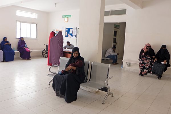 Women wait for treatment in the hospital, where Adan has overseen the training of more than 1,000 nurses, midwives and health professionals.