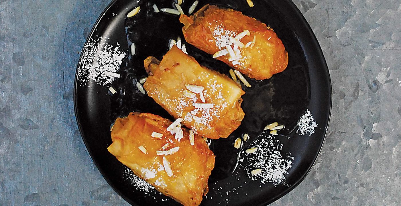 Flavors: Cheese Parcels with Honey and Orange Reduction