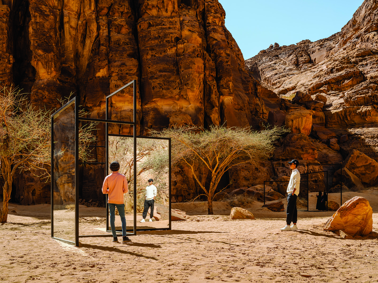 Installed at DesertX AlUla 2022, Berlin-based artist Alicja Kwade's 'In Blur" used steel and mirrors to amplify and complicate the sandy expanse under sandstone cliffs.