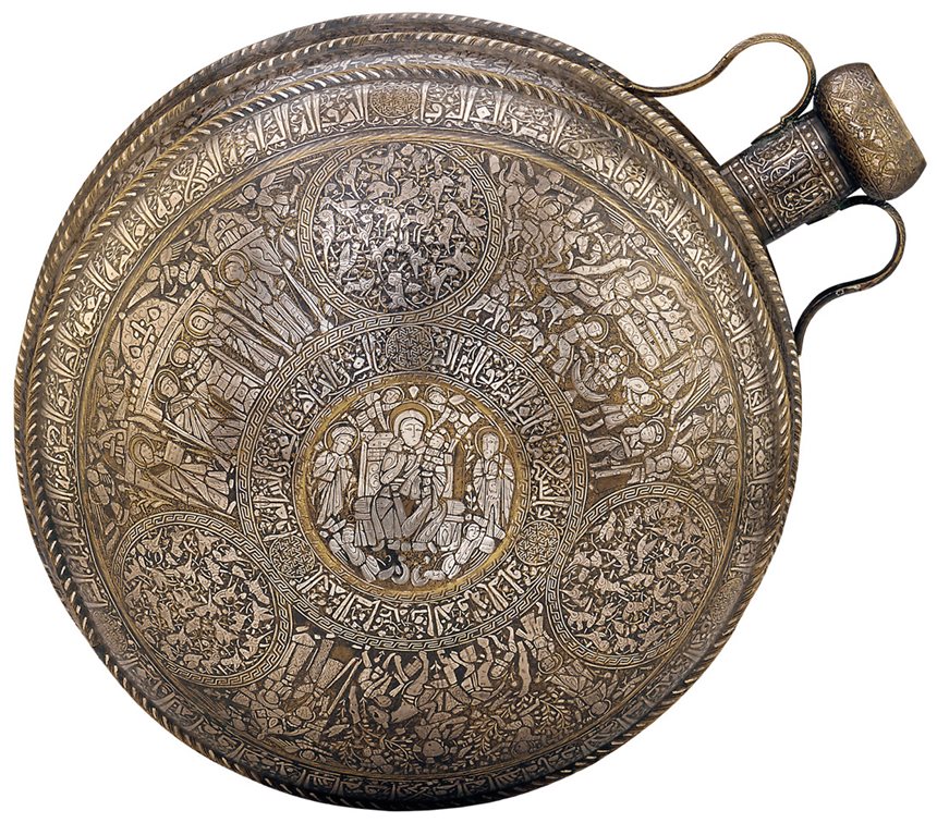 The metal inlay on this mid-13th century canteen from Syria or northern Iraq depicts scenes including the birth of Jesus with Mary and features inscriptions written in Kufic and in naskhi scripts.