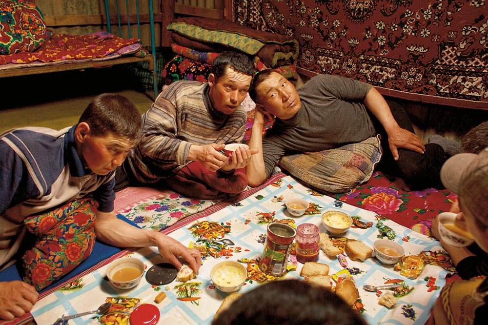 <p>“In 2000 there was huge unemployment, but things have gotten better,” said Adilbek Aymbetov, director of the plant. This allows young men such as these fishermen in Tastubek to stay for weeks at a time near the sea, fish at night and relax in between over <i>shay</i> (hot tea) and <i>kleb</i> (Russian for bread).</p>