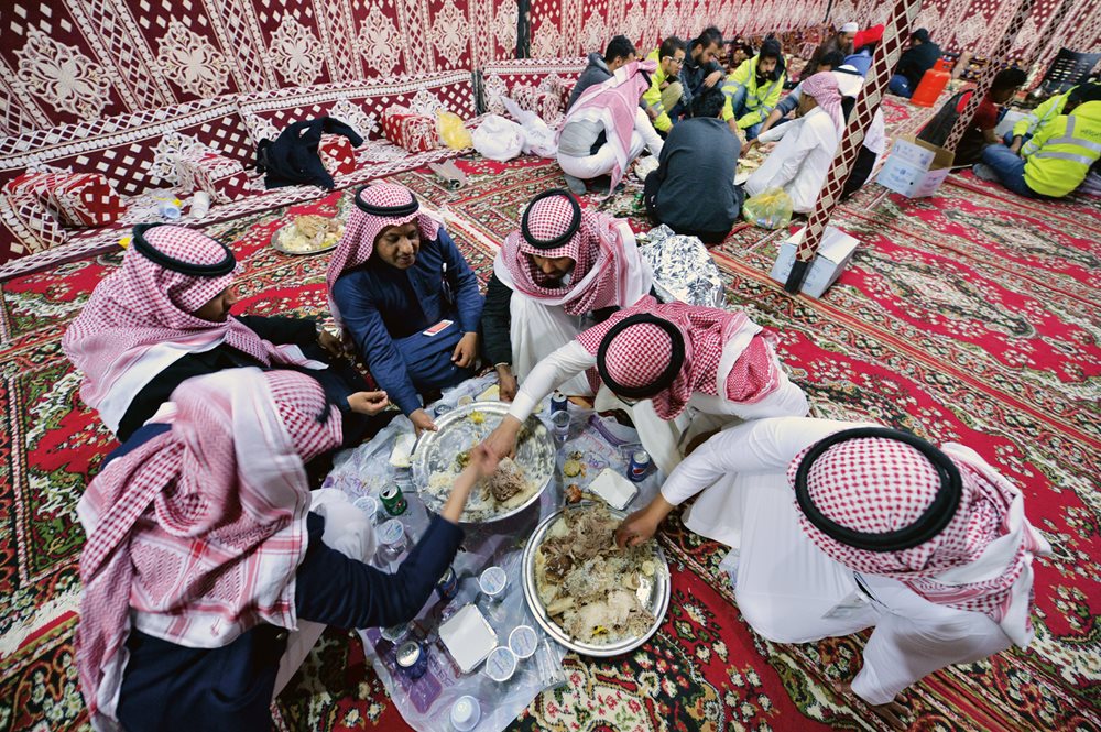 Trays of camel meat with rice make for traditional fare for owners, breeders and family members at the annual King Abdulaziz Camel Festival near Riyadh, Saudi Arabia. The meat of a single camel can feed up to several hundred people. Before refrigeration this meant that a camel would be slaughtered only for a major event.