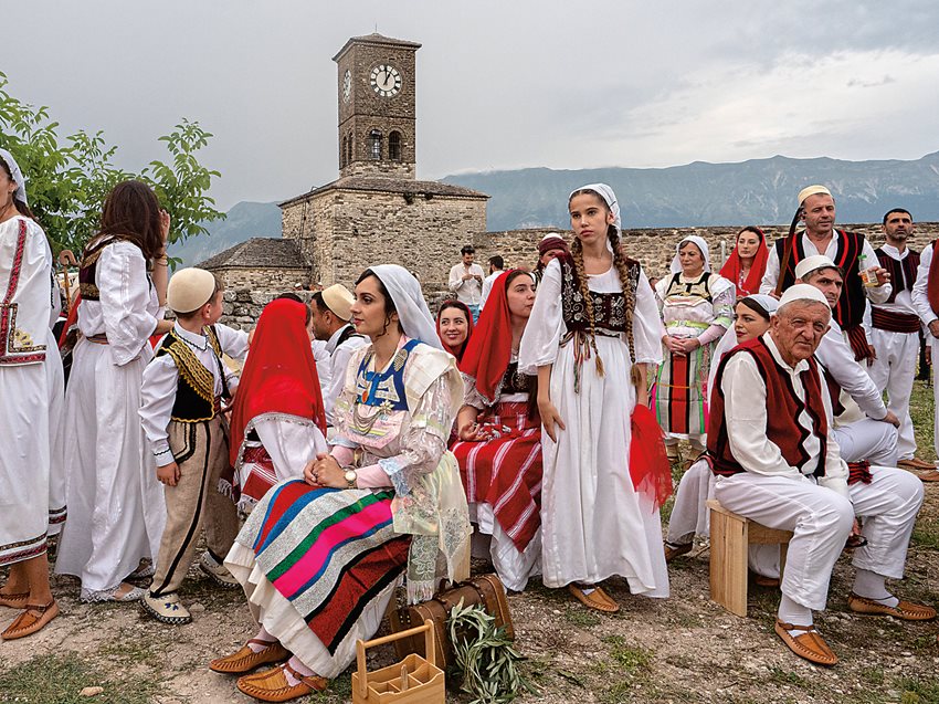 A group from the Albanian minority in Montenegro waits at the Castle of Gjirokastër on opening night of the festival. Ethnic Albanians made the trip to either perform or watch from Kosovo, North Macedonia, Greece and other countries.