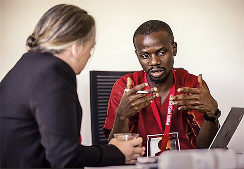 Photographer and video journalist Sodiq Adelakun Adekola, based in Abuja, Nigeria, leads a discussion at the 2022 Winners’ Program in Amsterdam. He also participated in the World Press Photo expert talks online.