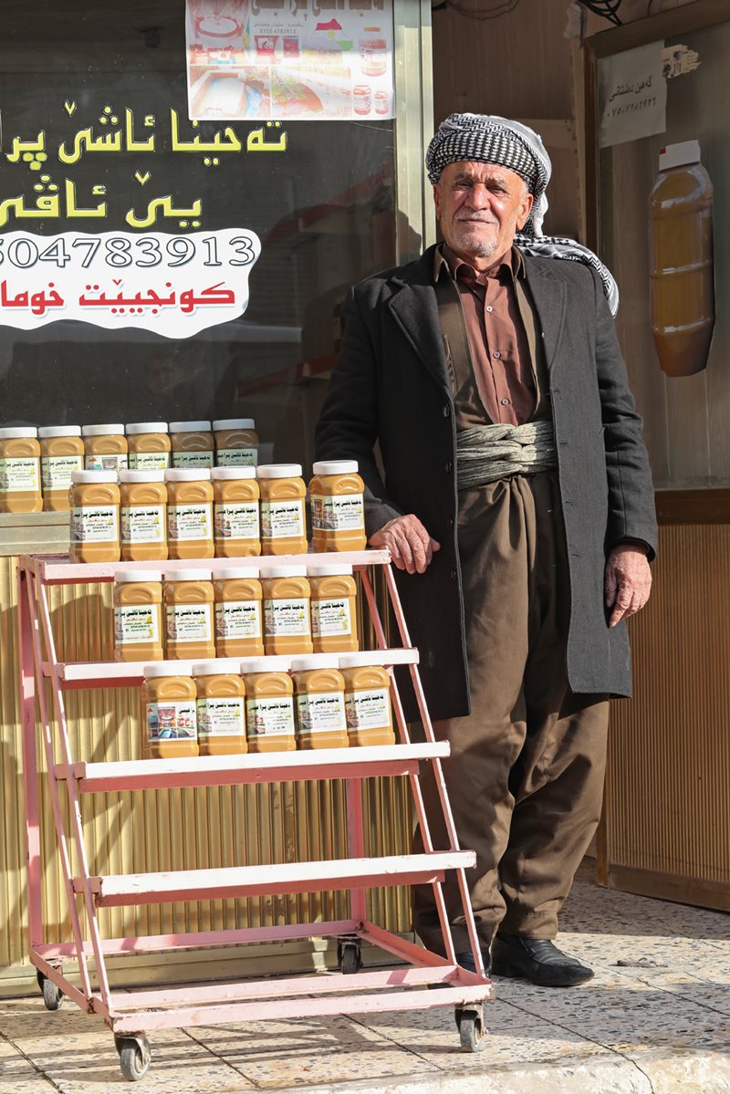 Part of Amedi’s cultural heritage lies in its food. In the city’s bazaar, jars of the sesame-seed paste tahini, for sale outside a shop, are a local specialty.
