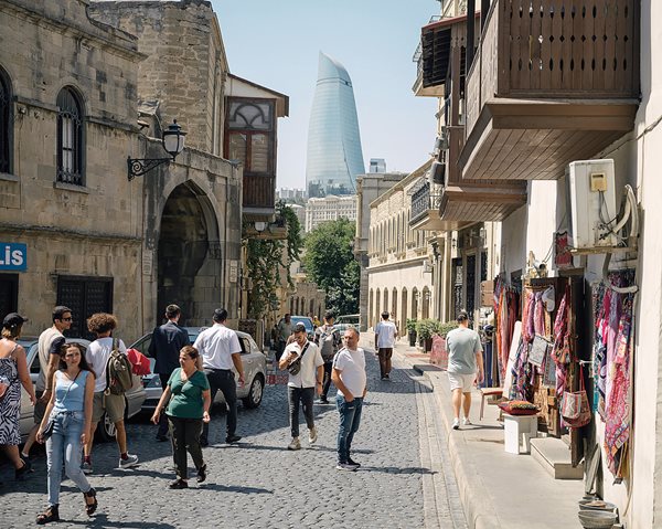 Past and present meet in Baku, where the old city is joined by contemporary skyscrapers like the Flame Towers, one of which is visible here. 