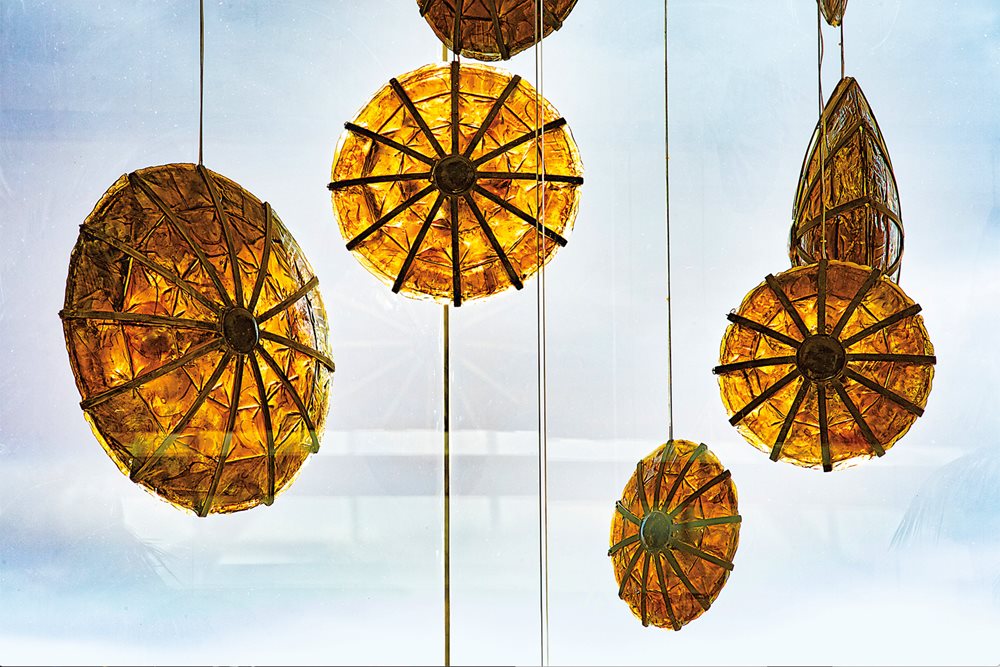 Disks of glass and metal that Keskes calls suns hang at the entrance of the Movenpick Resort and Spa in Sousse, along Tunisia’s east coast. The disks range from 70 to 120 centimeters in diameter and weigh up to 600 kilograms. Suspended by single wires, they shift with air currents and shimmer in the changing sunlight.